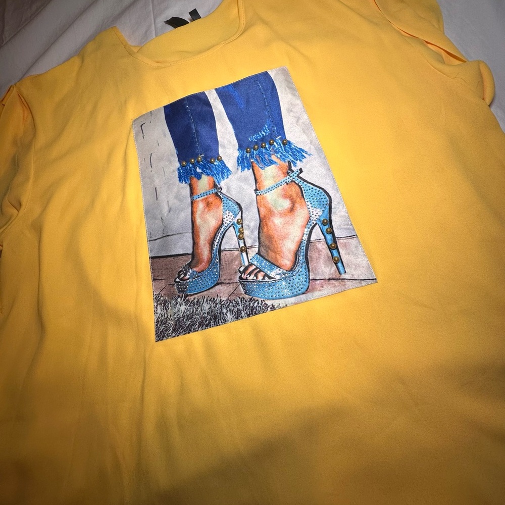 Yellow satin like blouse great to wear with skinny jeans. BRAND NEW